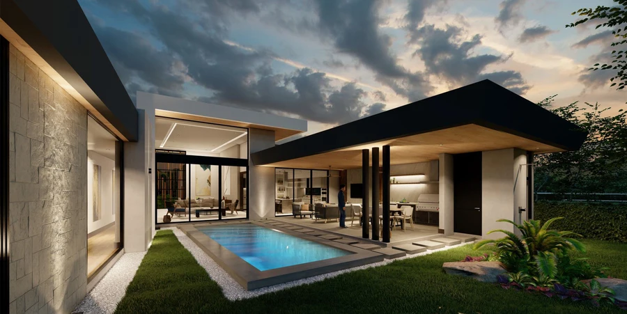 A modern home in Costa Rica with indoor-outdoor living and a pool at dusk.