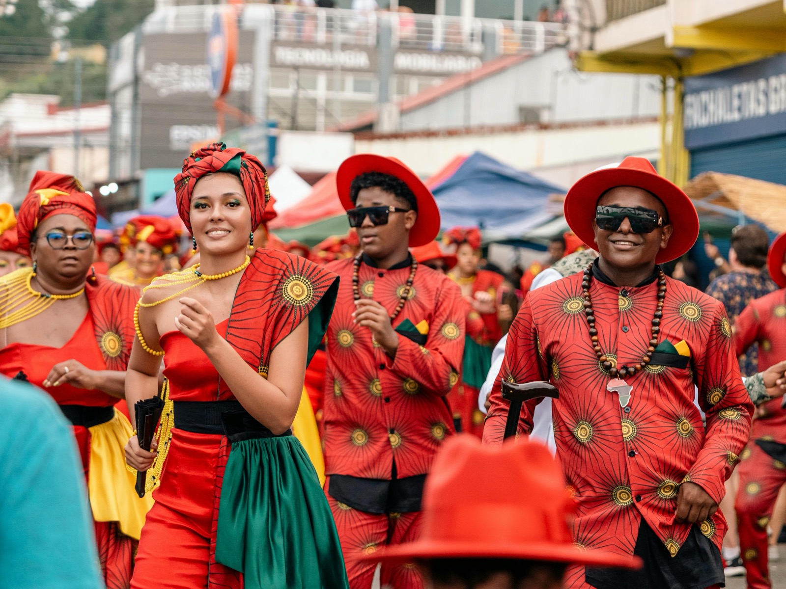 Grand Gala parade participant smiling in traditional attire